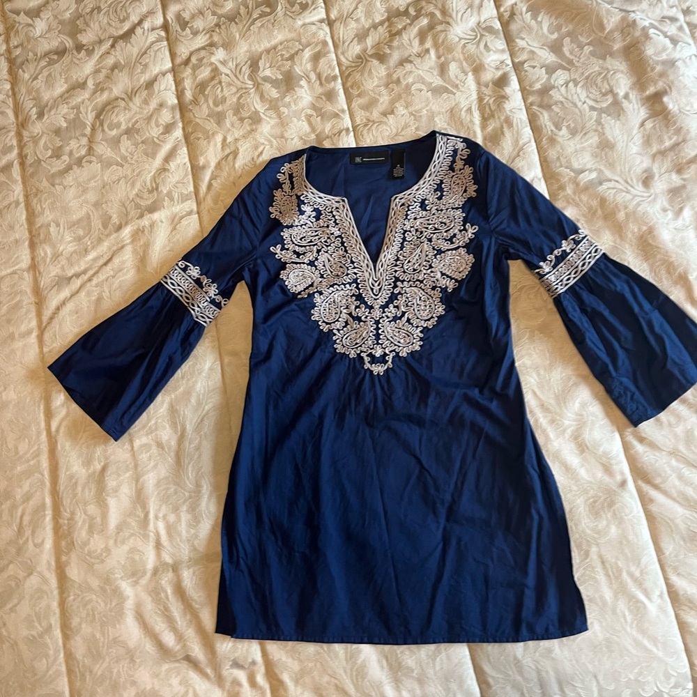 INC International Concepts cotton embroidered top with bell sleeves.
